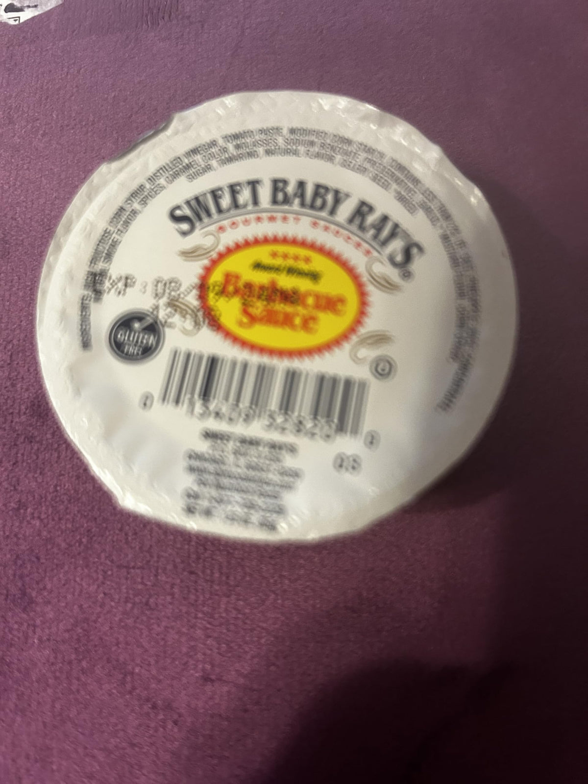 Sweet Baby Ray's Original BBQ sauce cups packshot highlighting portable packaging and convenience.