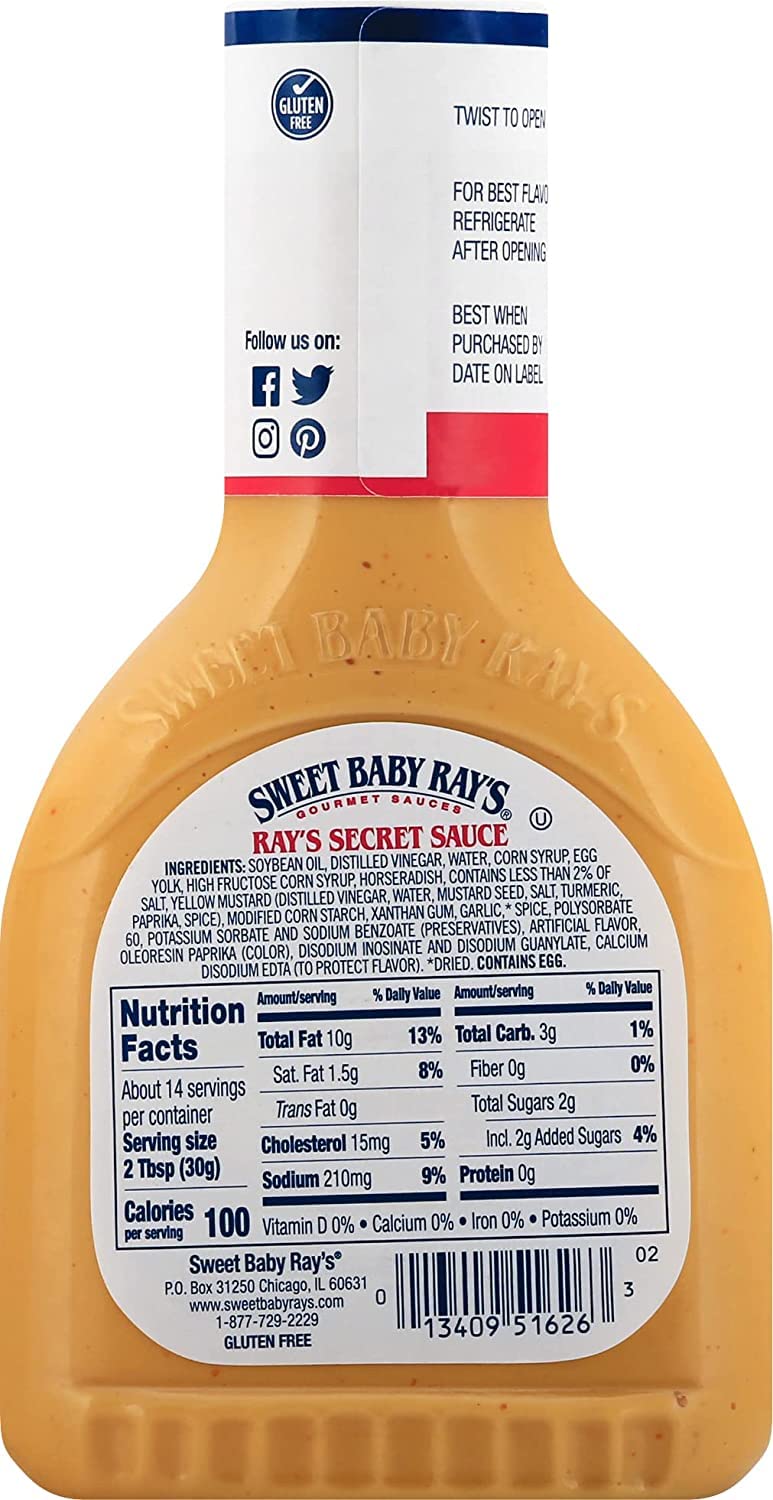 Crispy onion rings dipped in Sweet Baby Ray's Secret Sauce.