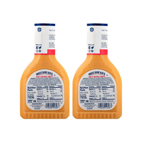 Pouring Sweet Baby Ray's Secret Sauce to dress a sandwich with zesty bite.