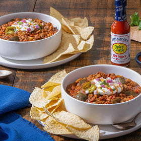 Two-pack display of Sweet Baby Ray's Spicy Garlic hot sauce for quick meals