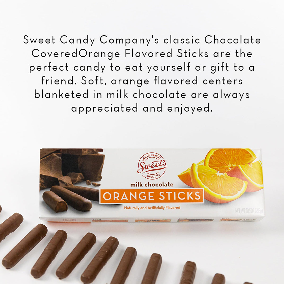 Close-up of orange-flavored center enrobed in milk chocolate by Sweet Candy Company.
