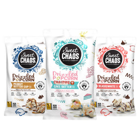 Sweet Chaos Cake Batter popcorn bag with drizzle, ideal for snacking
