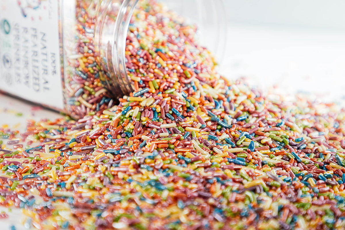 Sweet Eva’s Sprinkles on donuts deliver glossy, festive flair.