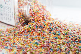 Sweet Eva’s Sprinkles on donuts deliver glossy, festive flair.