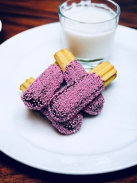 Sweet Eva’s pink pearl nonpareils sparkle on ice cream with delicate crunch