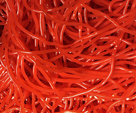 SweetGlob gummy shoe laces red strawberry close-up, inviting chewy texture