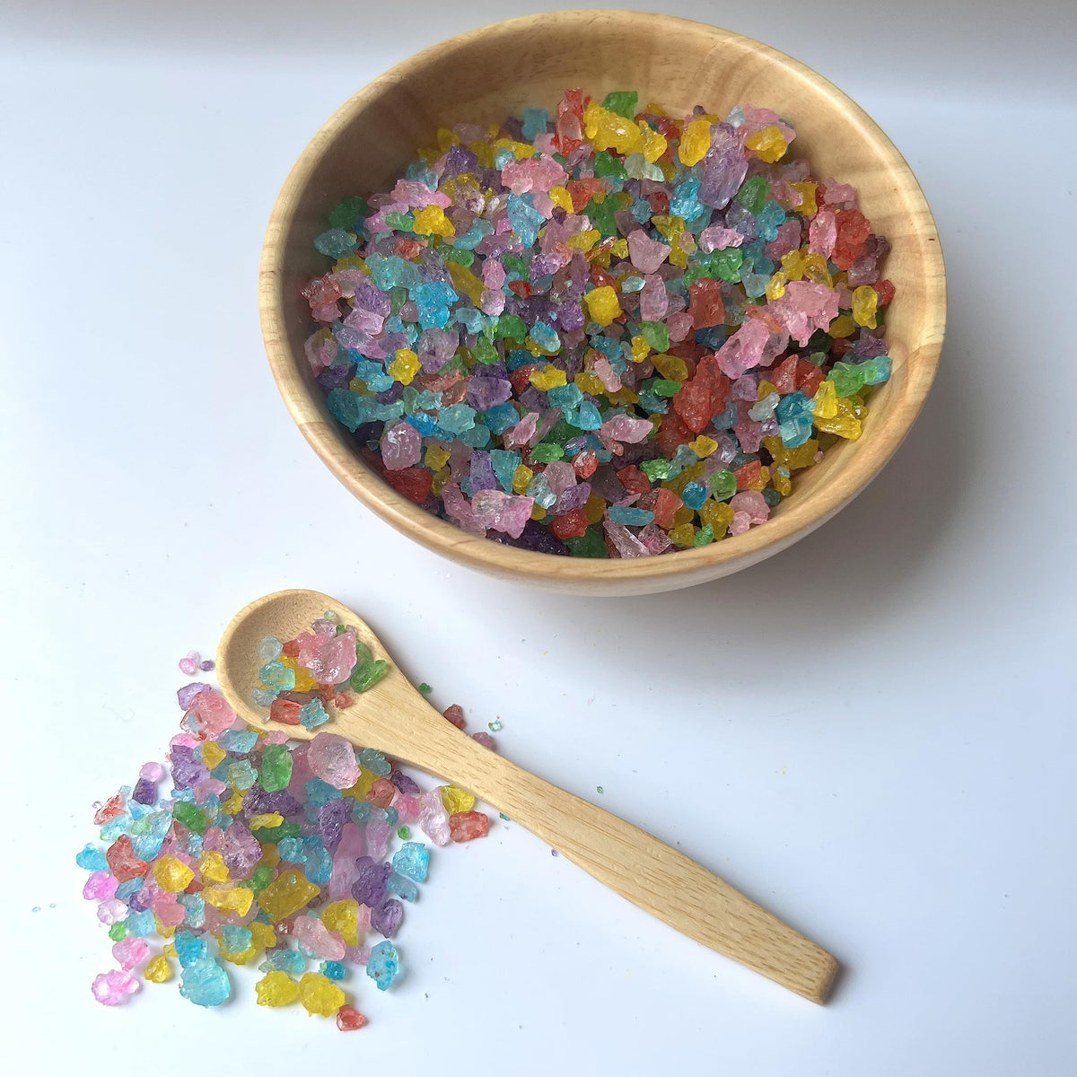 SweetGlob old-fashioned rock sugar candy gems poured into a cocktail for flavor