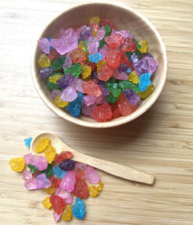 SweetGlob yellow mango flavor rock sugar gem enhances hot drinks.