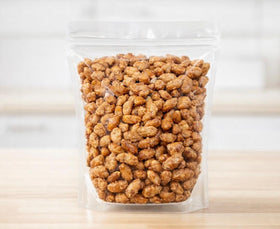 SweetGlob handful of toffee peanuts for quick, tasty snacking.