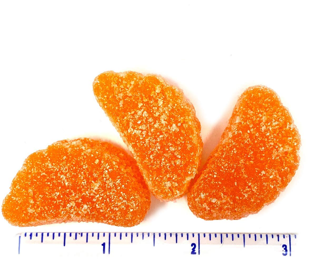 A serving dish featuring SweetGourmet orange fruit slices for guests