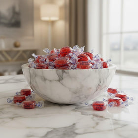 SweetGourmet sugar-free cinnamon discs display vibrant discs in bag.