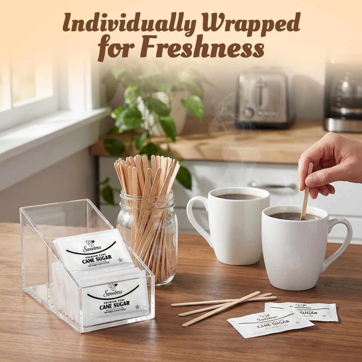 Sweetmo hotel breakfast bar displays organized sugar packets for guests.