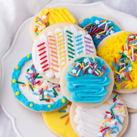 Sweets Indeed holiday colors frosting with black, orange, white for themed desserts