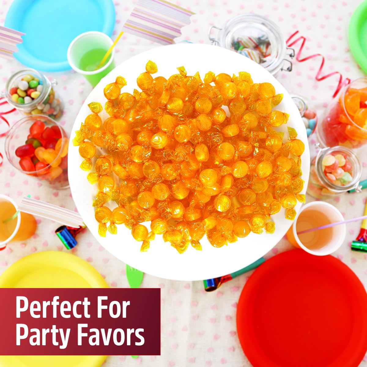 Bright party display with individually wrapped candies for guest favors.