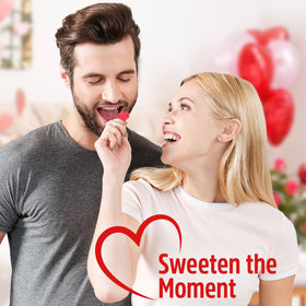 SWEETSIDE CANDY CO. Family sharing moment with gummy hearts, a tasty celebration.