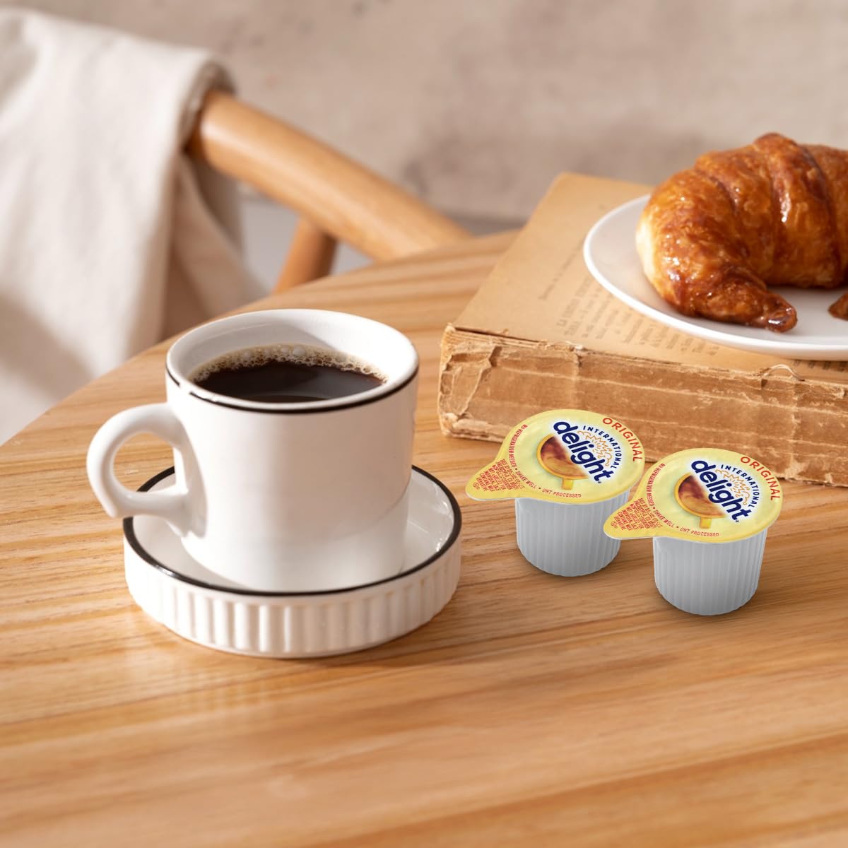 SWEETSIDE CANDY CO Original Coffee Creamer Singles enhance hot chocolate with creaminess.
