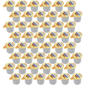 SWEETSIDE CANDY CO Original Coffee Creamer Singles 48-pack on kitchen counter for everyday convenience.