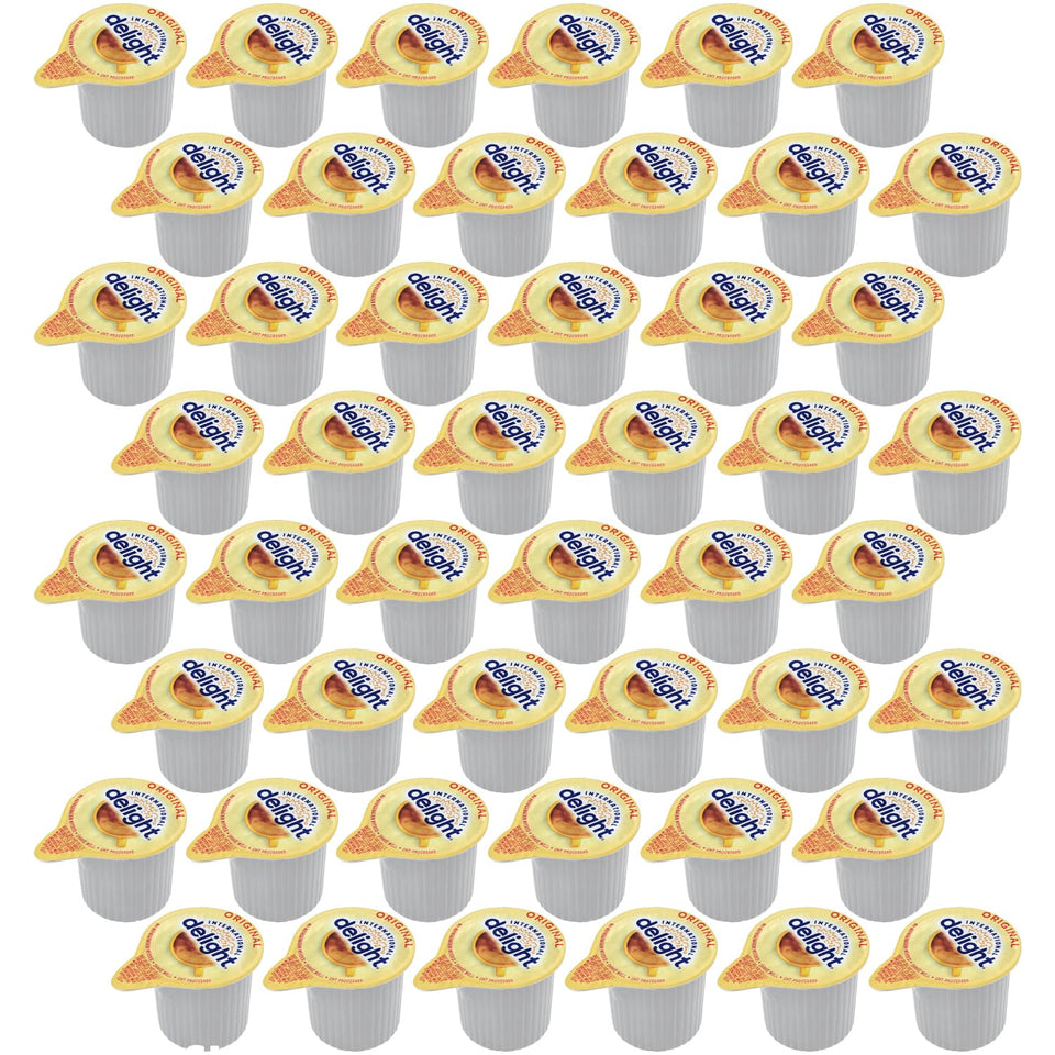 SWEETSIDE CANDY CO Original Coffee Creamer Singles 48-pack on kitchen counter for everyday convenience.