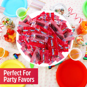 SWEETSIDE CANDY CO red licorice twists closeup showing individually wrapped pieces.