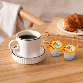SWEETSIDE CANDY CO. Silky caramel macchiato creamer for rich coffee.