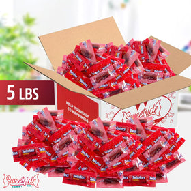 SWEETSIDE CANDY CO Twists Strawberry wrapped candy closeup highlighting freshness.