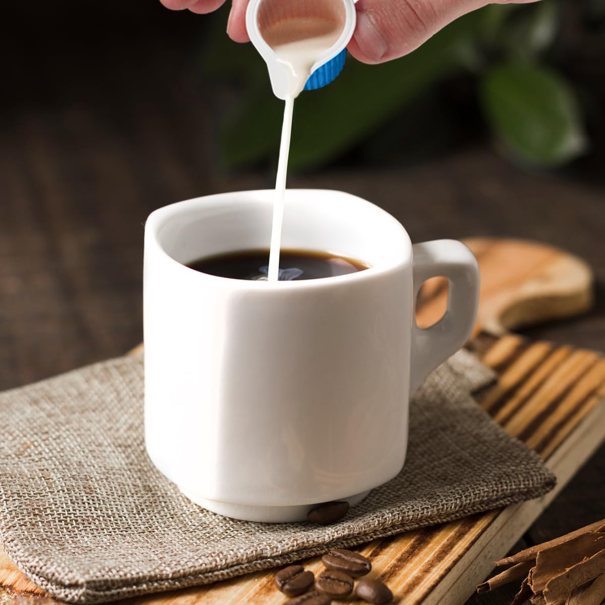 SWEETSIDE Office desk drawer with single-serve creamer pods for quick coffee upgrades