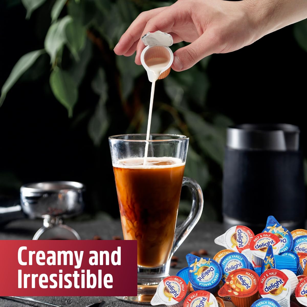 SWEETSIDE Cup of coffee with creamer being stirred for a smooth finish