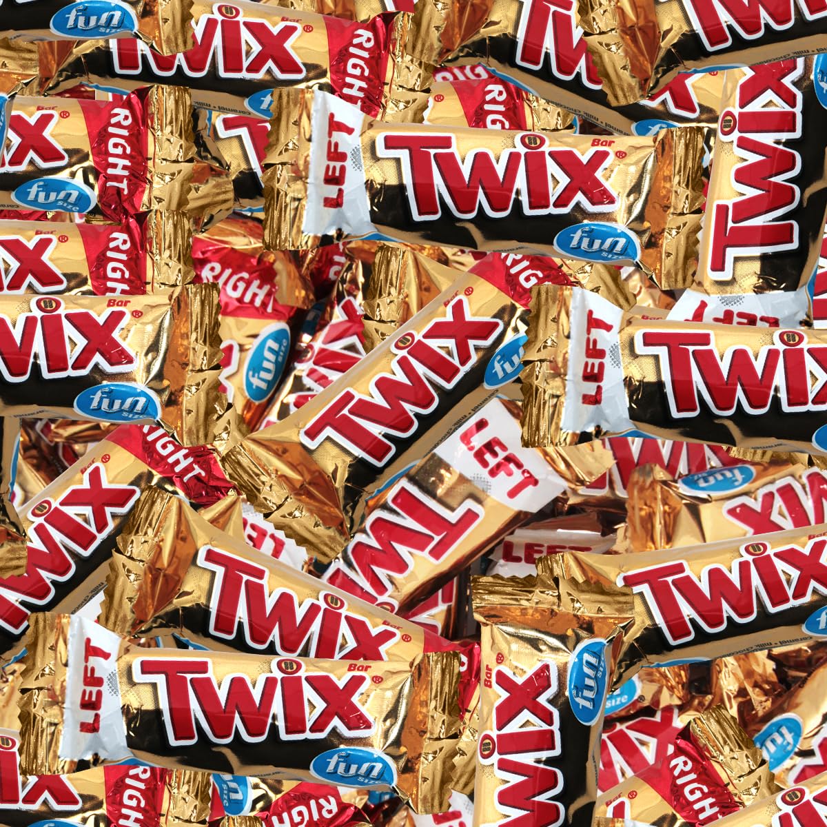 SWEETSIDE Twix hands holding bar, perfect sharing moment.