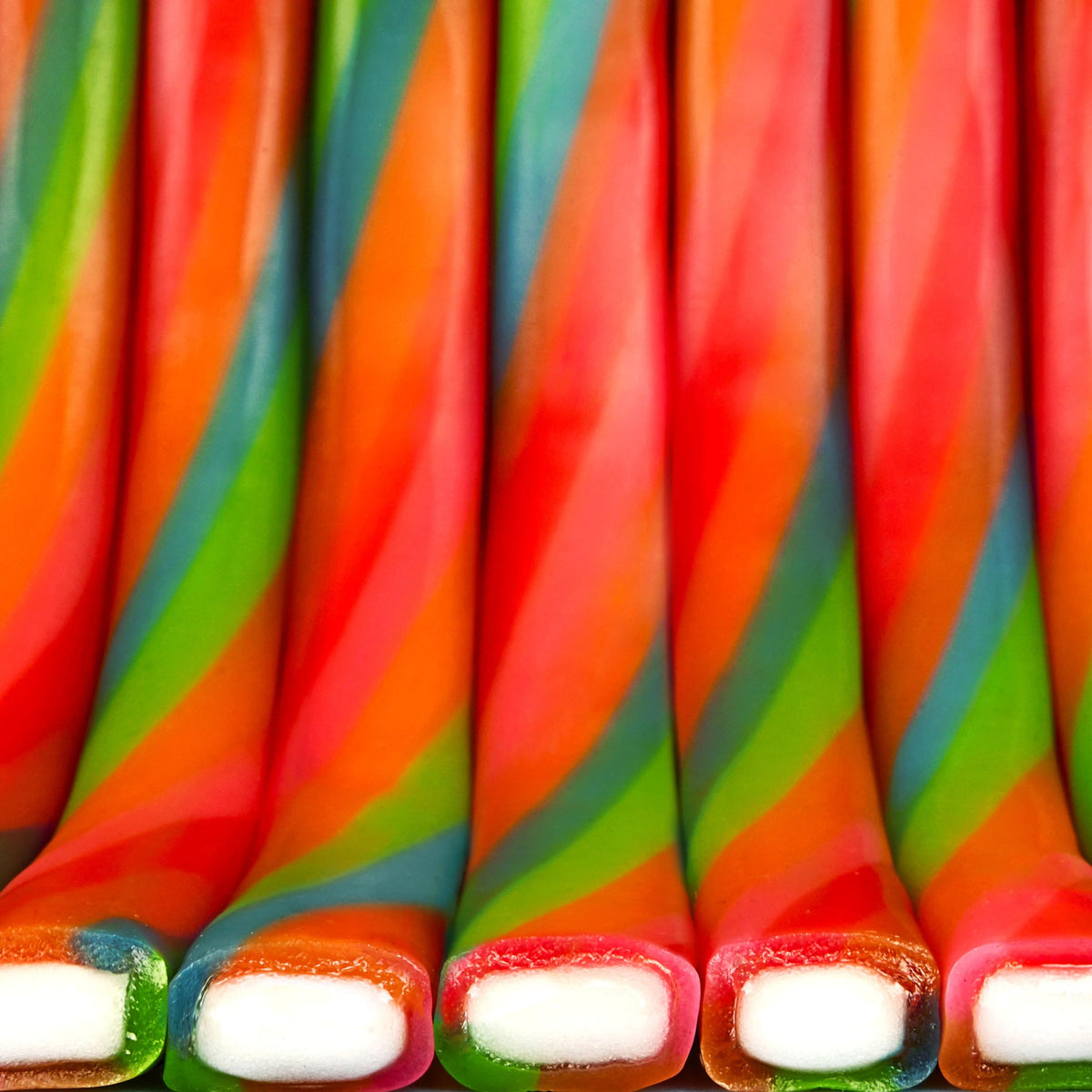 Assorted flavors imagined as a rainbow of tangy fruits