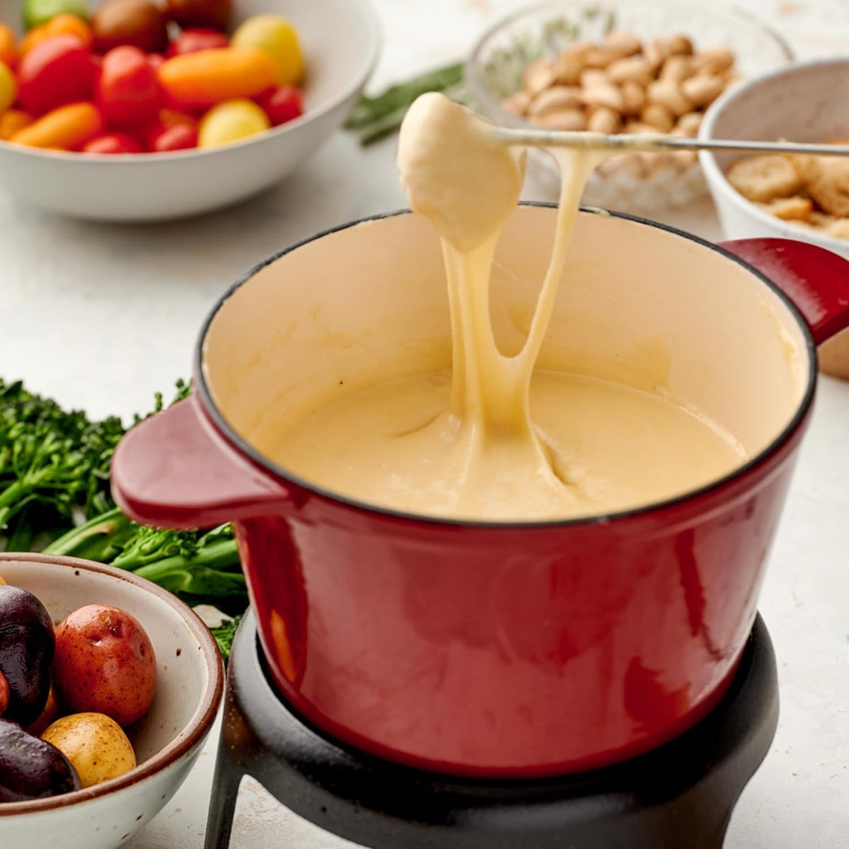 Swiss Knight L’Originale fondue night with charcuterie and friends
