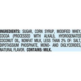 Close-up of Swiss Miss cocoa powder highlights premium ingredients for comforting drinks.