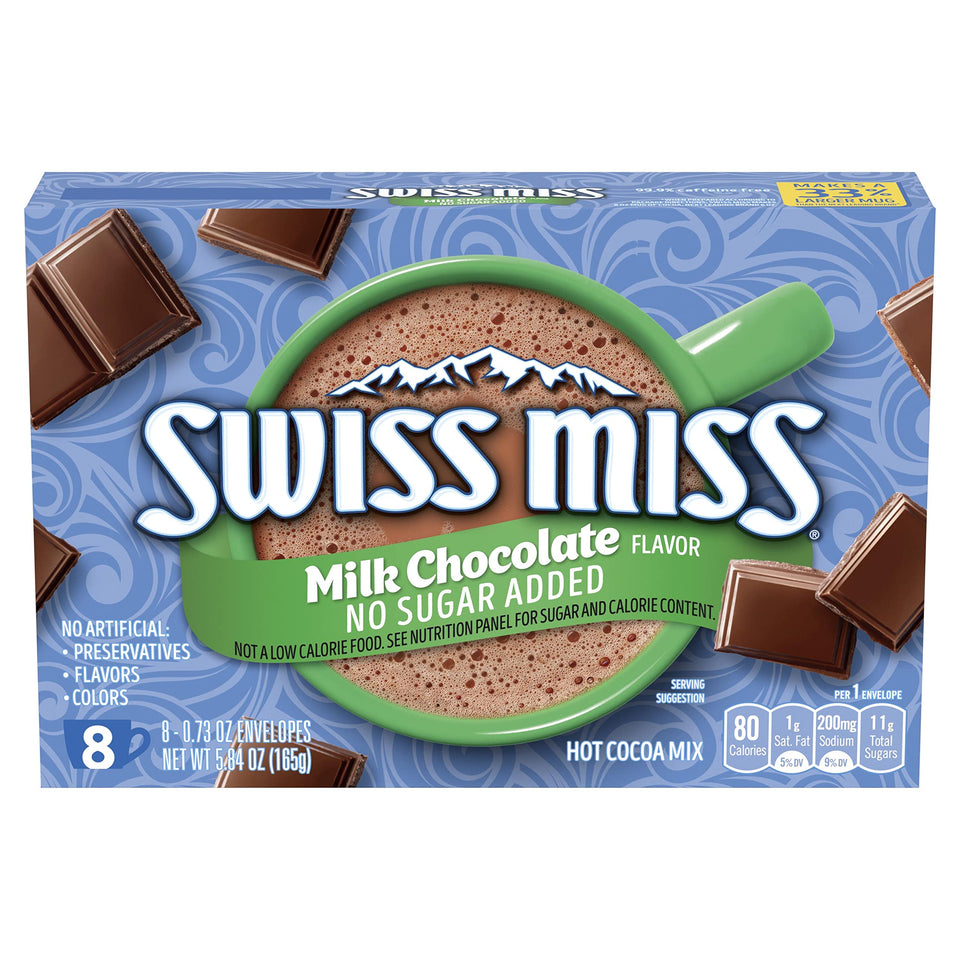 Swiss Miss no sugar added hot cocoa packaging in a cozy kitchen for a warm treat