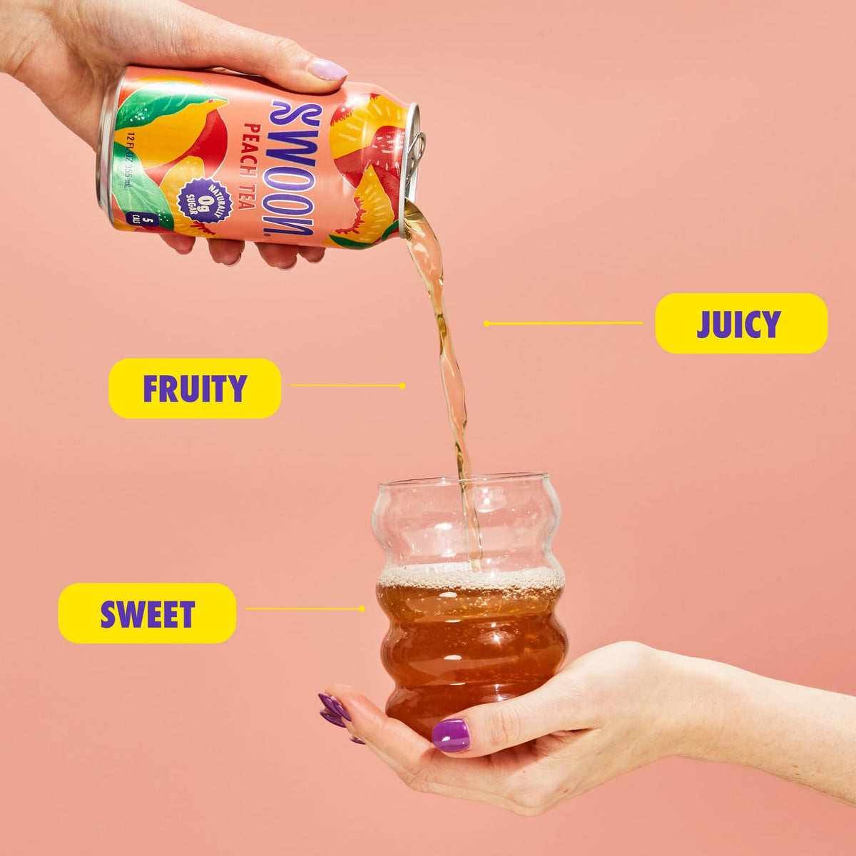 Swoon Peach Tea hand holding can for on-the-go keto refreshment