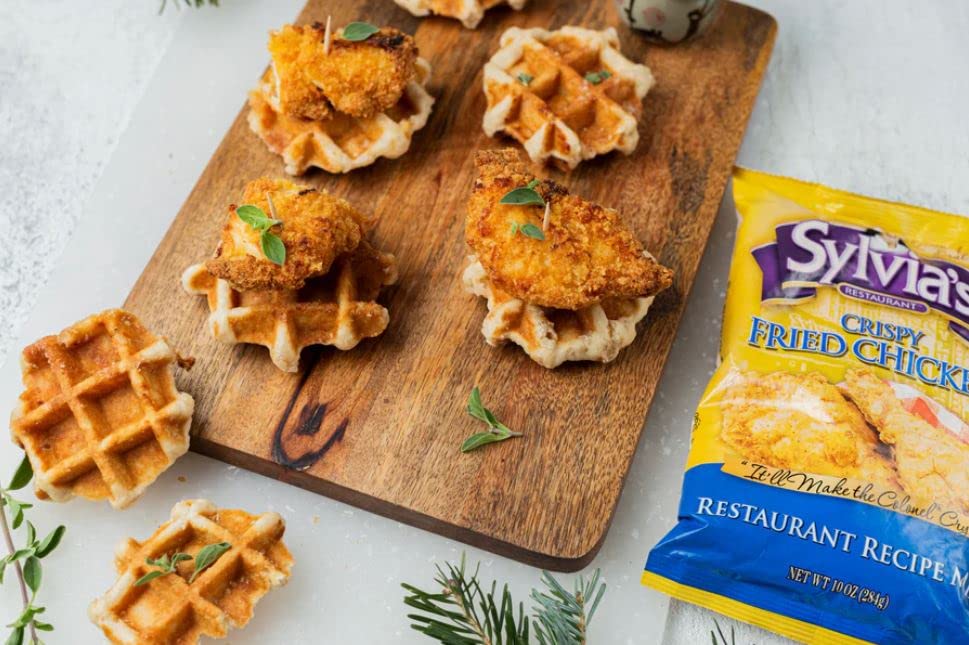 Coating application with Sylvia's chicken fry mix for even breading