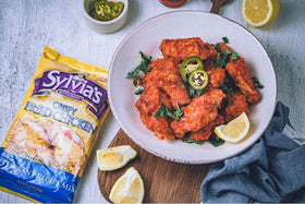 Frying with Sylvia's mix to achieve golden, crunchy chicken