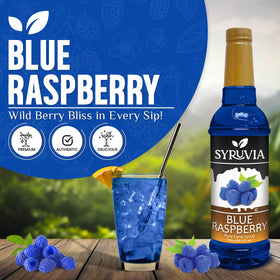 SYRUVIA Blue Raspberry Syrup being poured into a glass for a refreshing drink.