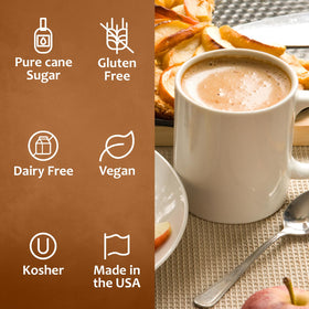 SYRUVIA coffee syrup bottle with pump beside foamy coffee