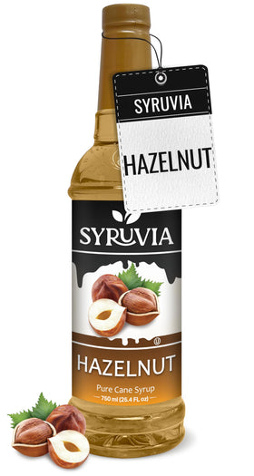 SYRUVIA Hazelnut Syrup bottle enhances coffee with rich, inviting aroma.