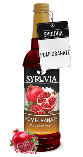 SYRUVIA Pomegranate Syrup bottle pour enhances cocktails with vibrant fruit flavor.