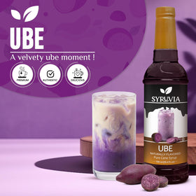 SYRUVIA Ube Syrup coffee flavoring poured into a mug.