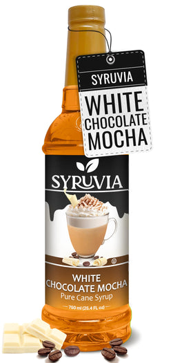 SYRUVIA White Chocolate Mocha Syrup bottle pour enhances latte flavor.