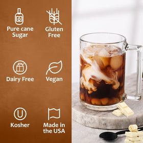 SYRUVIA White Chocolate Syrup drizzled atop desserts for rich sweetness.