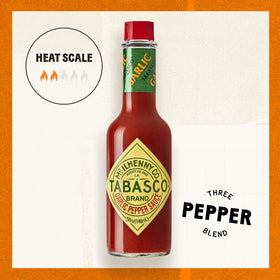 TABASCO Cayenne Garlic Sauce liquid stream enhances pizzas and pastas with garlic zest