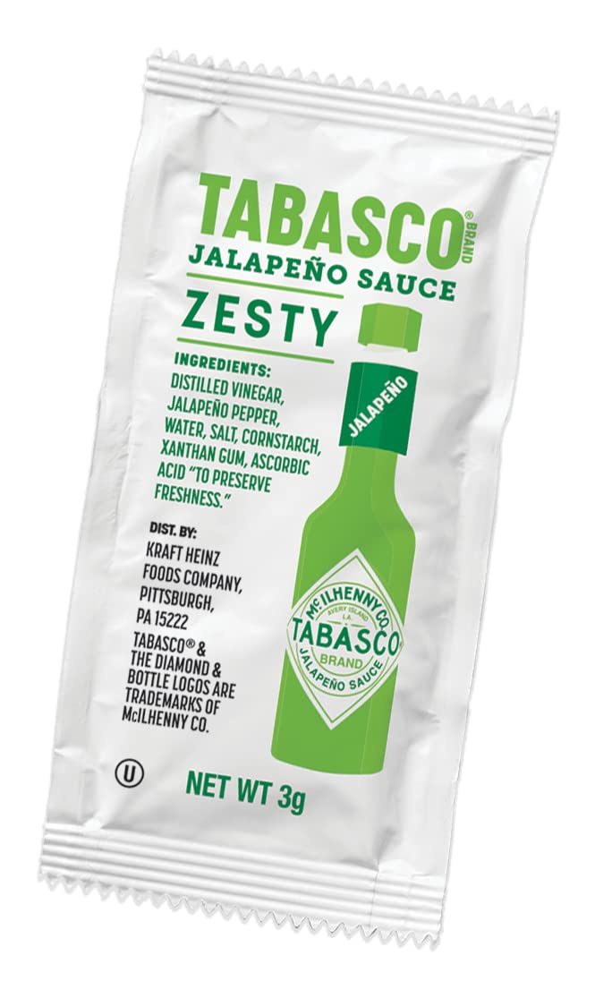 TABASCO Green Jalapeño sauce being poured over food adds mild heat and brightness