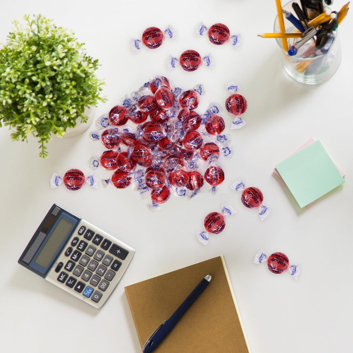 Close-up of Taboom cinnamon hard candy discs with fiery red color and bold aroma.