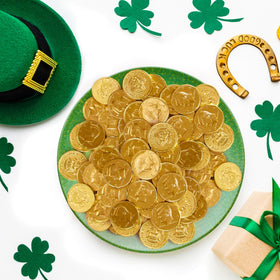Taboom gold coins displayed in a clear jar for gift-ready presentation.