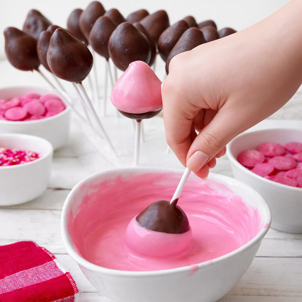 Taboom pink melts drizzling for vibrant cake tops and cookies.