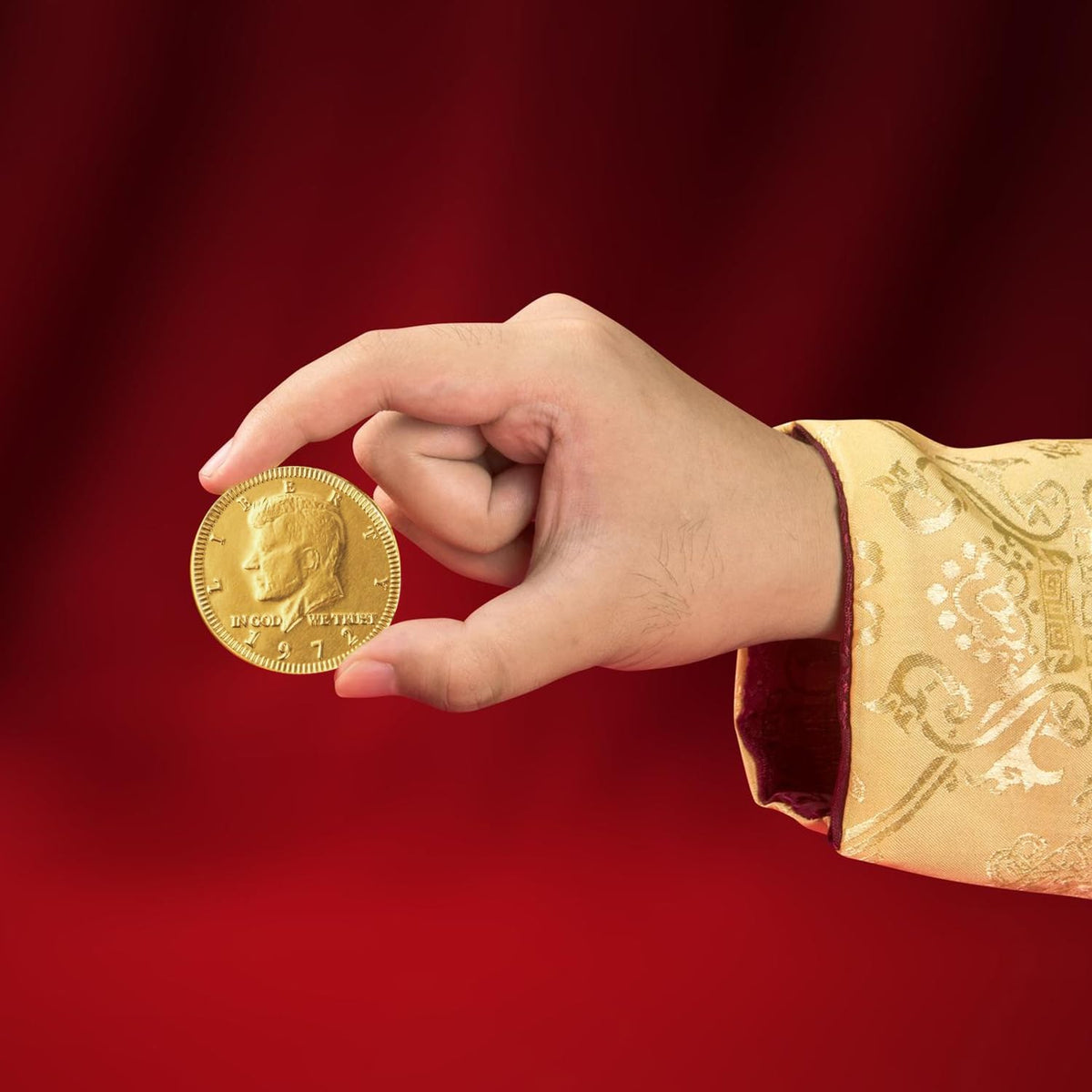 Taboom gold-wrapped chocolate coins as festive party favors for events.