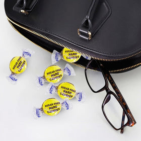Taboom sugar-free lemon candy discs for quick, refreshing breaks.