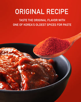 Taekyung chili powder fine powder close-up showing bright red texture.
